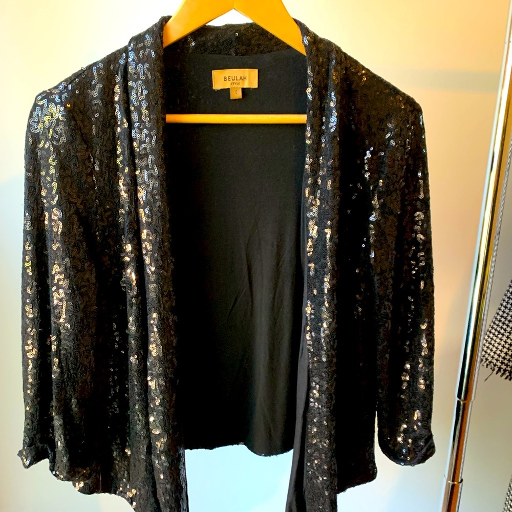 Beautiful light, black sequinned jacket